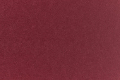 Deep, rich red crafting paper viewed in detail. 