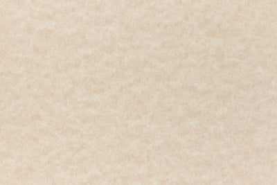 Light brown parchment paper sample. 